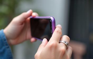 Someone creating a short video on a smartphone for social media